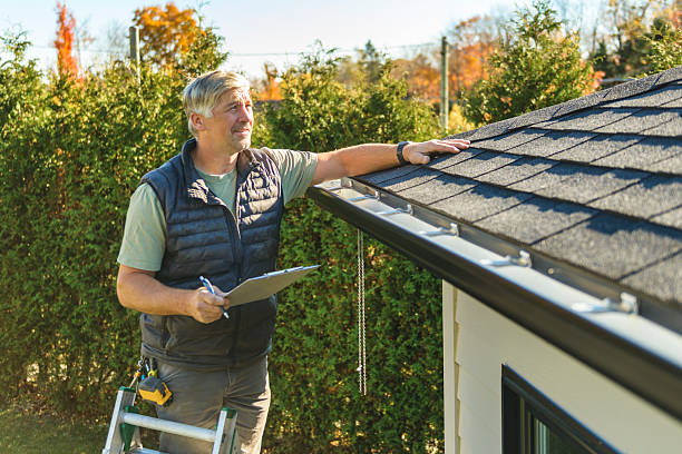 Professional Hail Damage Roof Repair technician working in Tipton, CA